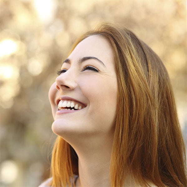 Woman happy and smiling because she is pain free